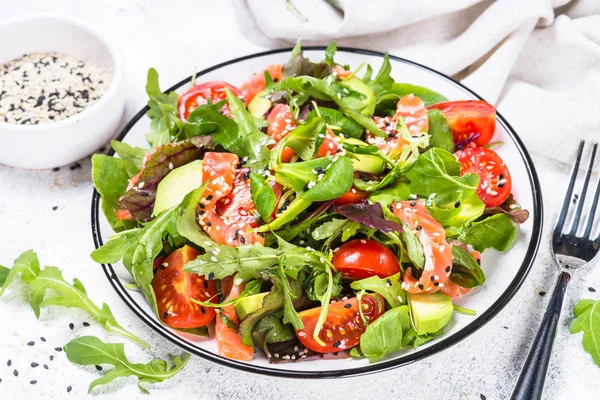 Salmon salad with fresh vegetables on white. — Stock Photo, Image