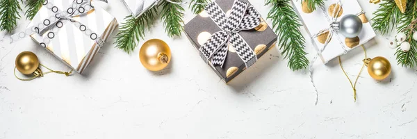 Christmas background with Gold present box and decorations. — Stock Photo, Image
