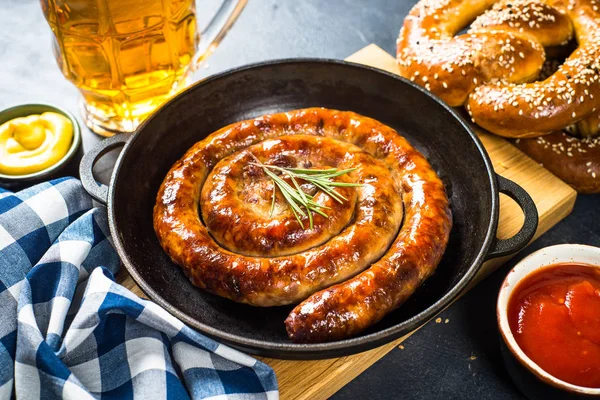 Oktoberfest food - sausage, sauerkraut, beer and bretzel. — Stock Photo, Image