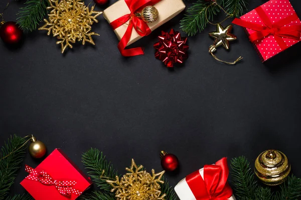 Christmas background with decorations on black. — Stock Photo, Image