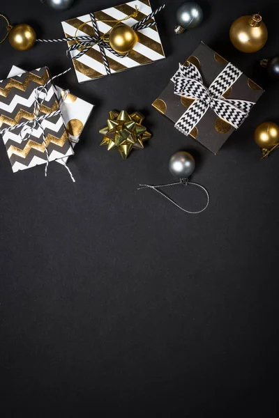 Christmas background with decorations on black. — Stock Photo, Image