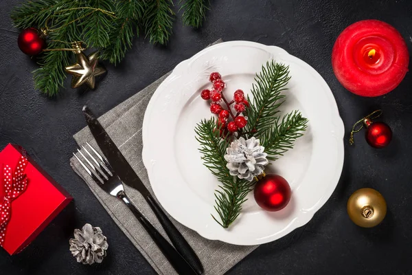 Christmas table setting on black — Stock Photo, Image