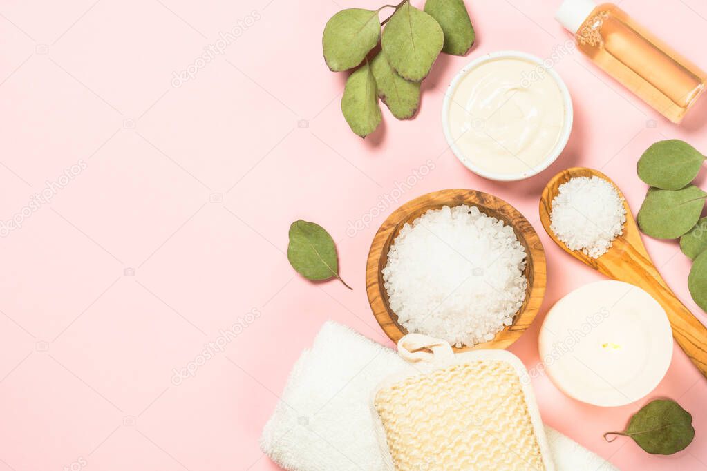 Spa background with natural cosmetic product on pink bakground, flat lay.