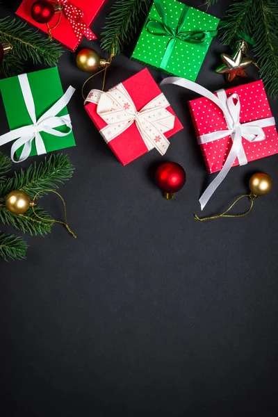 Christmas background with decorations on black. — Stock Photo, Image