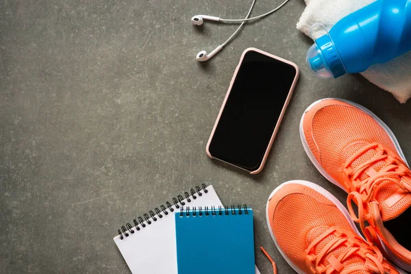 Fitness equipment at stone background top view. — Stock Photo, Image