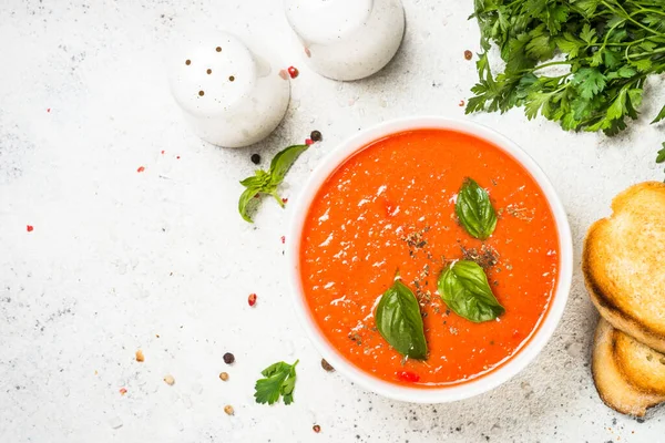 Tomato soup at white table. — Stock Photo, Image