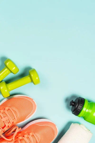 Fitness equipment at blue background top view. — Stock Photo, Image