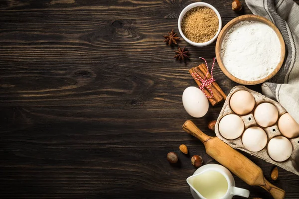 Baking ingredients on kitchen table. — Stock Photo, Image