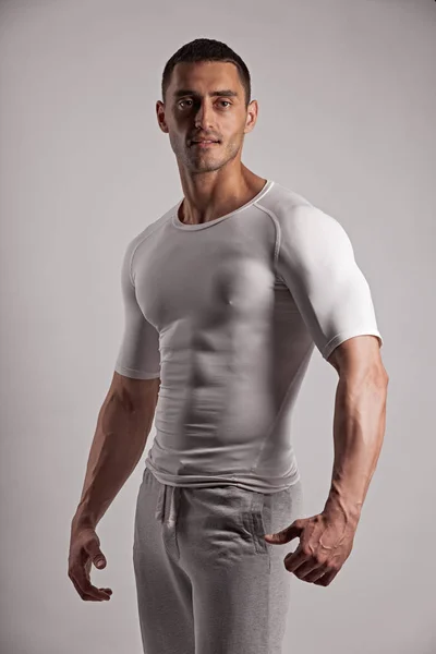 Portrait Muscular young man posing — Stock Photo, Image