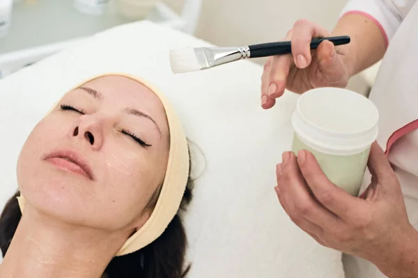 Cosmetician. facial mask — Stock Photo, Image