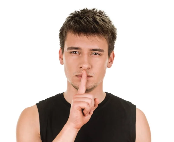 Young man shows sign of silence — Stock Photo, Image