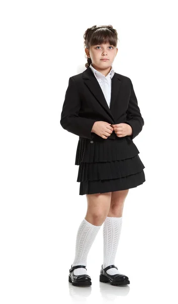 Školačka v černé uniformě — Stock fotografie