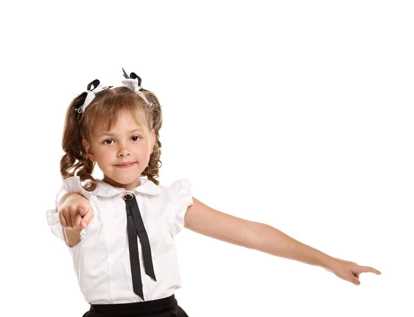 Schattig schoolmeisje wijzen — Stockfoto