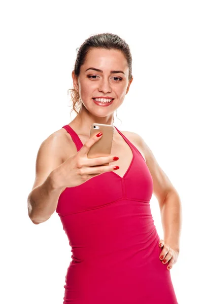 Jonge fitness vrouw nemen selfie — Stockfoto