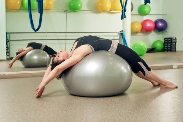 Exercise on fitness ball — Stock Photo, Image