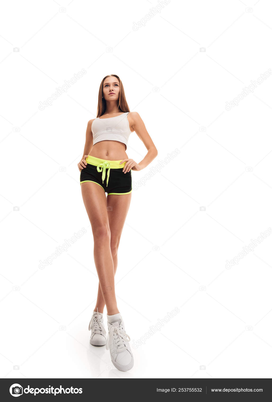 Sporty fitness woman. long legs Stock Photo by ©seenaad 253755532