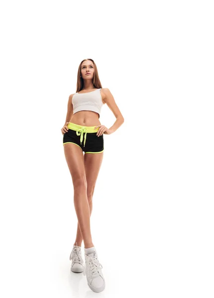 Mujer deportiva de fitness. piernas largas — Foto de Stock