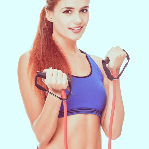 Fitness-Frau mit Expander — Stockfoto