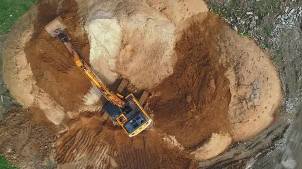 The crawler excavator moves the sand to the shoulder. — Stock Footage The crawler excavator moves the sand to the shoulder. Royalty Free Stock Footage