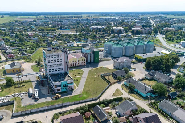 The territory of an industrial plant. The enterprise on processing of grain. View from above