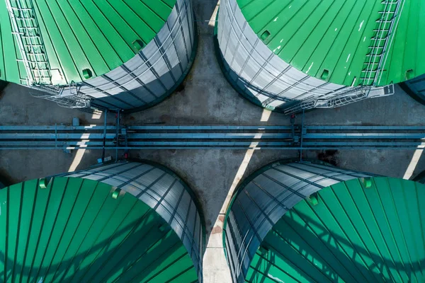 Silos of the granary. A modern warehouse of wheat and other cereals. View from above.