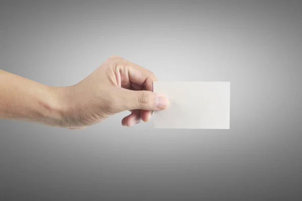 Χέρι κρατώντας την εικονική κάρτα με το — Φωτογραφία Αρχείου