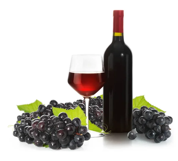 Glass of red wine and a bottle — Stock Photo, Image