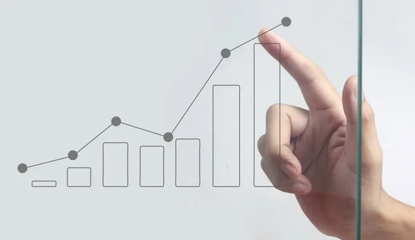 Hand touching  graphs of financial indicator and accounting mark — Stock Photo, Image