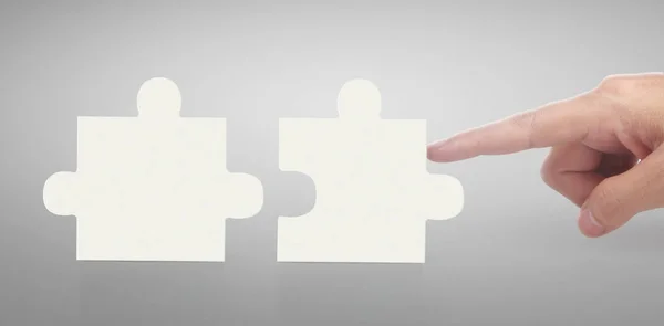 Hand Connecting Jigsaw Puzzle Concept Teamwork Isolated — Stock Photo, Image