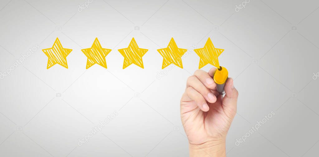 Hand draw a five star rating. evaluation and review concepts