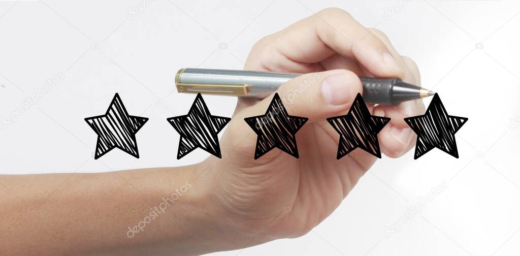 Hand draw a five star rating. evaluation and review concepts