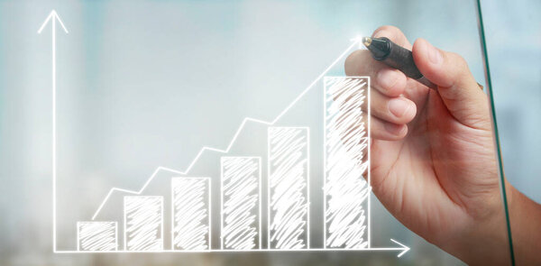 Hand drawing a chart, graph stock of growth