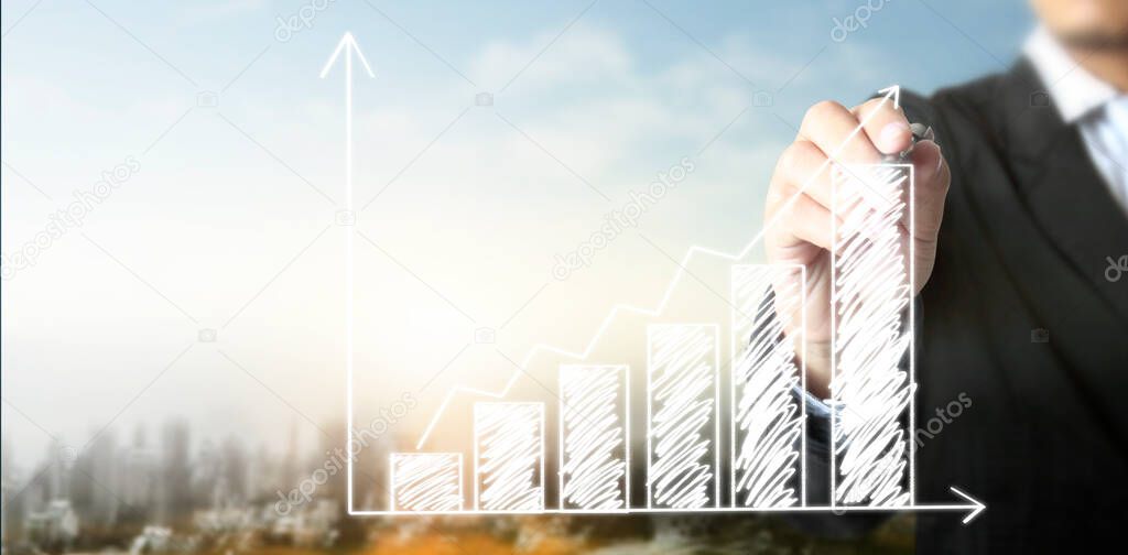 Hand drawing a chart, graph stock of growth