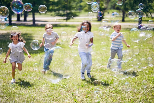 Cute Little Kids Enjoying Warm Summer Day Outdoors Running Green — Stock Photo, Image