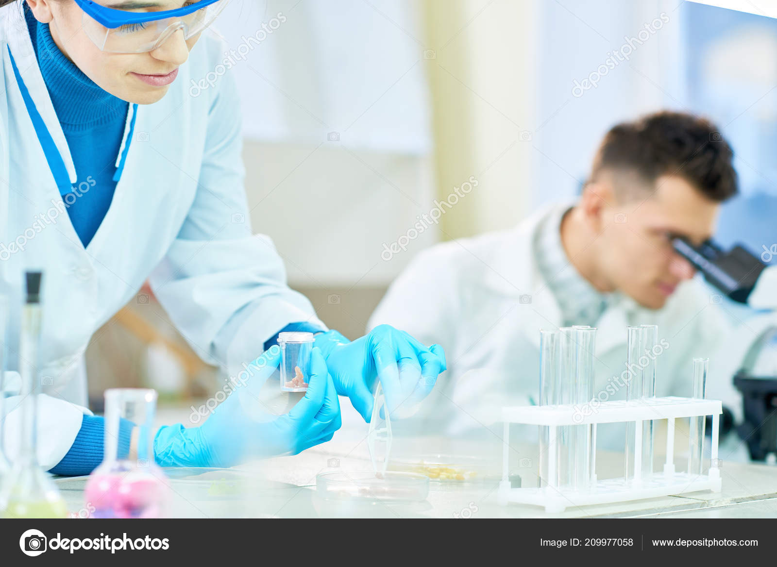 Pretty Young Scientist Wearing Safety Goggles White Coat Standing Lab Stock Photo Pretty Young Scientist Wearing Safety Goggles White Coat Standing Lab Stock Photo