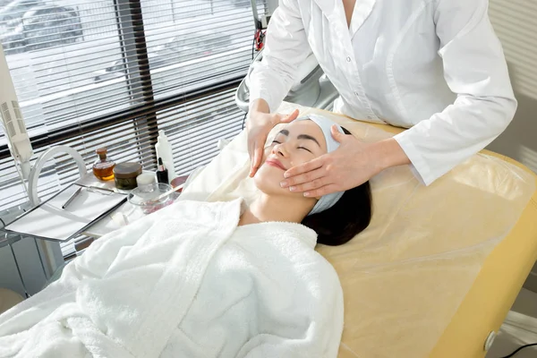 Portrait Blissful Asian Woman Enjoying Relaxing Face Massage While Lying — Stock Photo, Image