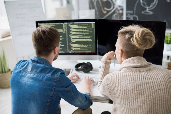 Back View Portrait Two Contemporary Program Developers Writing Code Sitting — Stock Photo, Image
