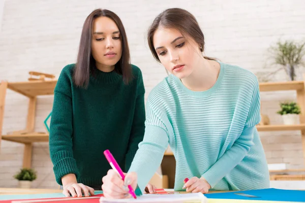 Attractive Young Student Wearing Knitted Sweater Using Felt Tip Pen — Stock Photo, Image