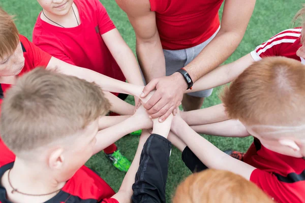 High Angle Junior Football Team Stacking Hands Motivational Pep Talk — Stock Photo, Image