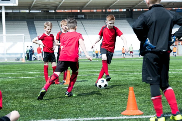 Full Length Portrait Junior Football Team Practicing Stadium Focus Boy — Stock Photo, Image