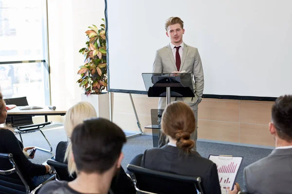 Portrait Young Businessman Standing Podium While Giving Speech Conference — Stock Photo, Image
