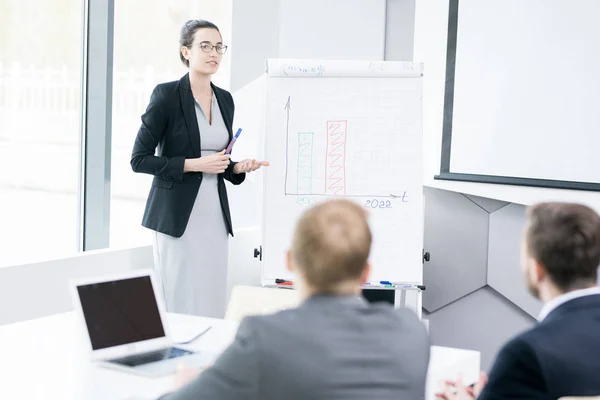 Portrait Young Businesswoman Wearing Glasses Standing Whiteboard Explaining Marketing Strategy — Stock Photo, Image