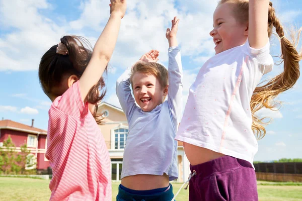 Waist Portrait Three Excited Kids Cheering Happily Raising Hands While — Stock Photo, Image