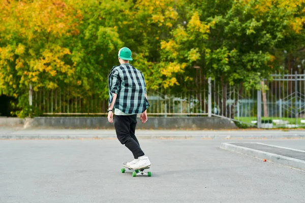 Full Length Back View Portrait Contemporary Young Man Riding Skateboard — Stock Photo, Image