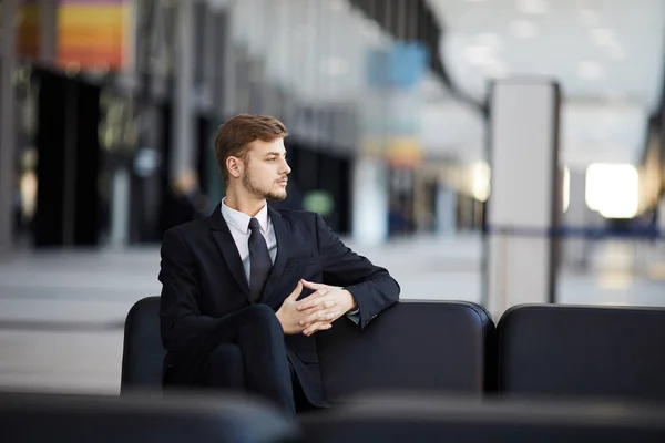 Side View Portrait Successful Young Businessman Sitting Leather Chair Lobby — Stock Photo, Image