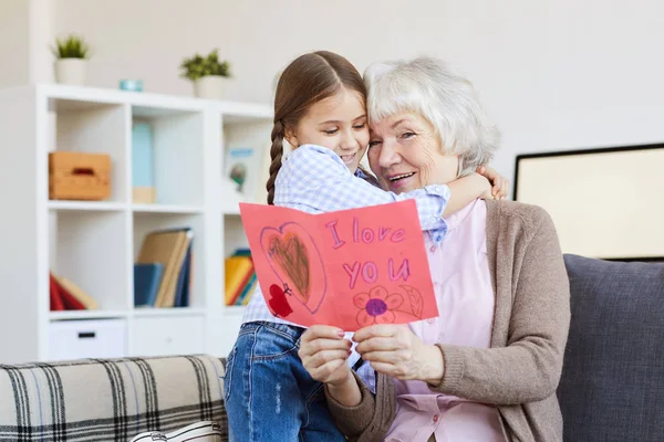 Portrait Cute Little Girl Hugging Grandma Giving Her Handmade Love — Stock Photo, Image