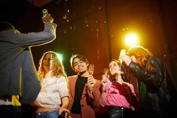 Cheerful Carefree Young People Casual Clothing Dancing Flutes Dark Room — Stock Photo, Image