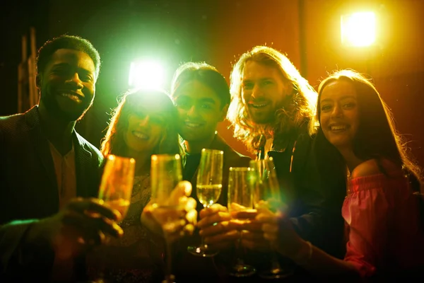 Cheerful Exited Young Multiethnic Friends Standing Line Disco Lights Posing — Stock Photo, Image