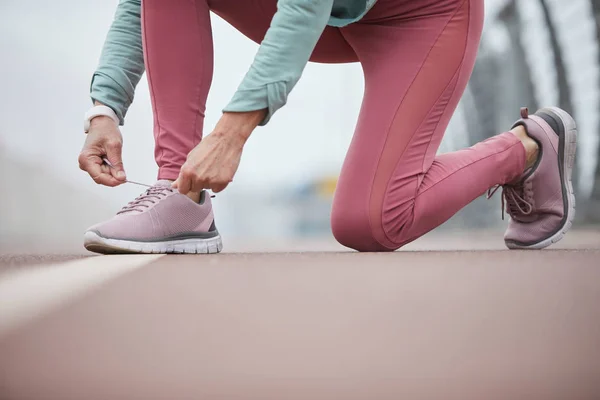 Low Section Mature Contemporary Sportswoman Tying Shoelace One Sneakers Racetrack — Stock Photo, Image