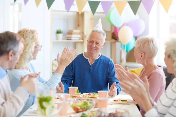 Group Excited Friends Sitting Dining Table Applauding Birthday Man While — Stock Photo, Image